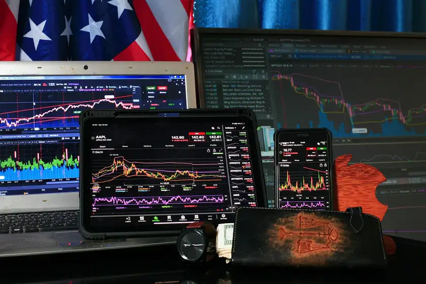 Several trading terminals displaying order books and candlestick charts side by side